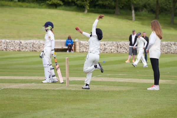 girls-cricket-bowler