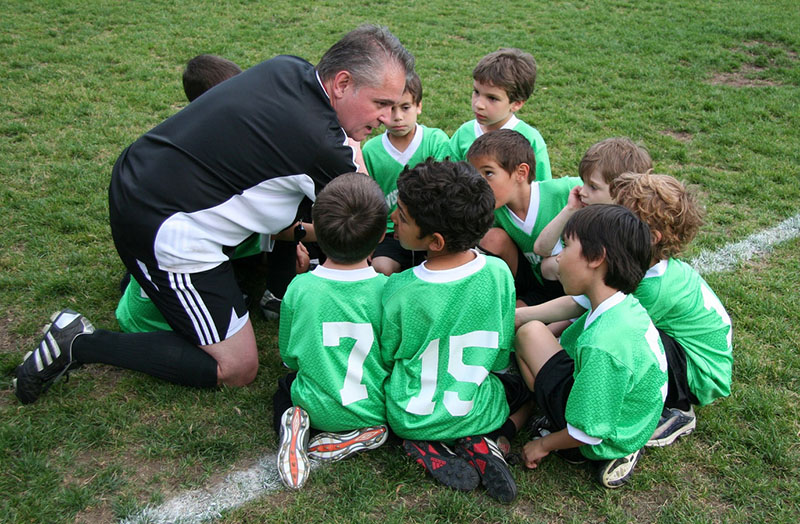 What qualifications do I need to be a football coach?