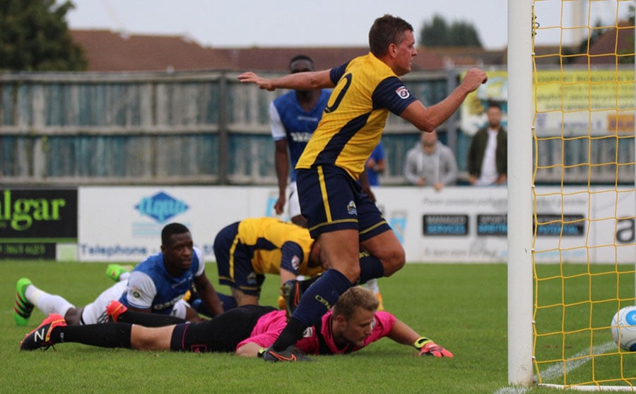 football players scramble for the ball