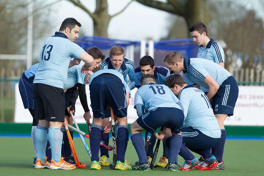 field hockey team huddle